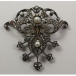 Early 20th century old cut diamond and pearl pendant, gold backed silver setting, swivel link 5.