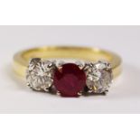 Ruby and diamond three stone gold ring hallmarked 18ct, ruby approx 1.1 carat and diamonds 1.