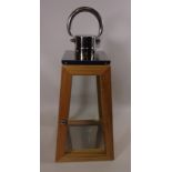 Light wood and metal pyramid table lantern,