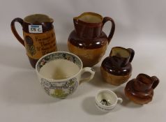 Royal Doulton salt glazed jug, 'For Every Ill' , three Doulton Lambeth graduating jugs,