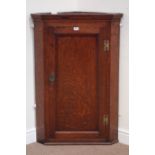 Early 19th century oak and mahogany banded corner cabinet, enclosed by single door, W74cm,