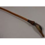 Riding crop with carved duck head and glass eyes Condition Report <a