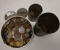 British and foreign coins predominantly early and mid 20th Century in an old cigarette tin,