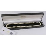 Cultured pearl necklace the clasp with inset ruby stamped 750 Condition Report