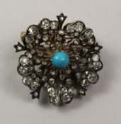 Victorian open floral set diamond brooch with turquoise centre stone 18ct gold backed silver set