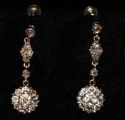 Pair of Belle Epoque diamond floral pendant ear-rings in enclosed silver settings 3.