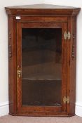 20th century corner cabinet enclosed by glazed door, W67cm,