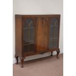 Mid 20th century mahogany display cabinet, enclosed by three doors, W122cm, H123cm,