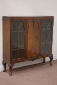 Mid 20th century mahogany display cabinet, enclosed by three doors, W122cm, H123cm,