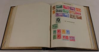 An Album containing British Empire & Commonwealth stamps Victoria to early QE II including GB with