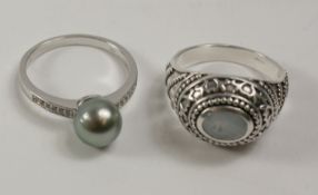 Tahitian pearl & white topaz ring and a ring set with an aquamarine both stamped 925