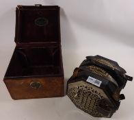 Leather cased ebonised and metal 48 button Concertina by C. Wheatstone & Co, London.