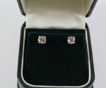 Pair of diamond stud ear-rings, round, brilliant cut approx 1.