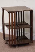 Early 20th century oak two tier revolving bookcase, 42cm x 42cm,