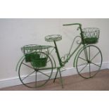 Wrought metal bicycle planter finished in antique green, W142cm,