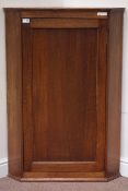 Oak wall hanging corner cabinet, fitted with three shaped front shelves, W75cm,