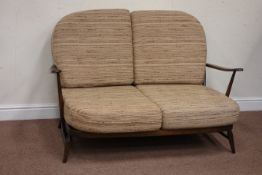 Ercol 'Windsor' stained beech two seat sofa, with upholstered loose cushions,