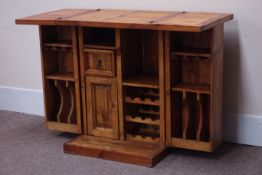 Pine bar cabinet, foldover top, fitted with double cupboard, enclosing wine and drink holders,