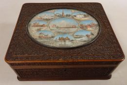 Late 19th century Indian box, lid watercolour painted on ivory with sights of interest in oval,