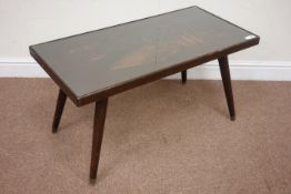 Oriental carved coffee table raised on tapering legs, 91cm x 45cm,