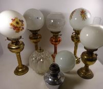 Two oil lamps, three brass electric oil lamps,