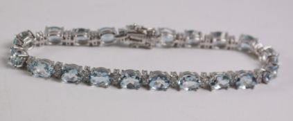 Oval aquamarine and diamond bracelet stamped 750 (aquamarine approx 14 carat) Condition