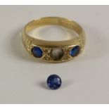 Early 20th century three stone sapphire rub-over ring Birmingham 1928 (one loose stone)