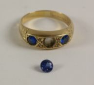 Early 20th century three stone sapphire rub-over ring Birmingham 1928 (one loose stone)