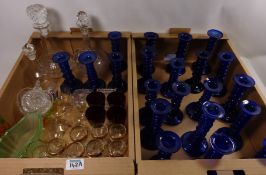 Large collection of blown glass candle sticks and other glassware in two boxes Condition