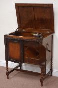 Early 20th century oak cased 'Tetraphone' gramophone with vintage records, W71cm, H80cm,