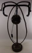 Metal floor lamp made from bike and other parts Condition Report <a