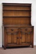 Ercol dresser fitted with two drawers and two cupboards, with plate rack, W123cm, H173cm,