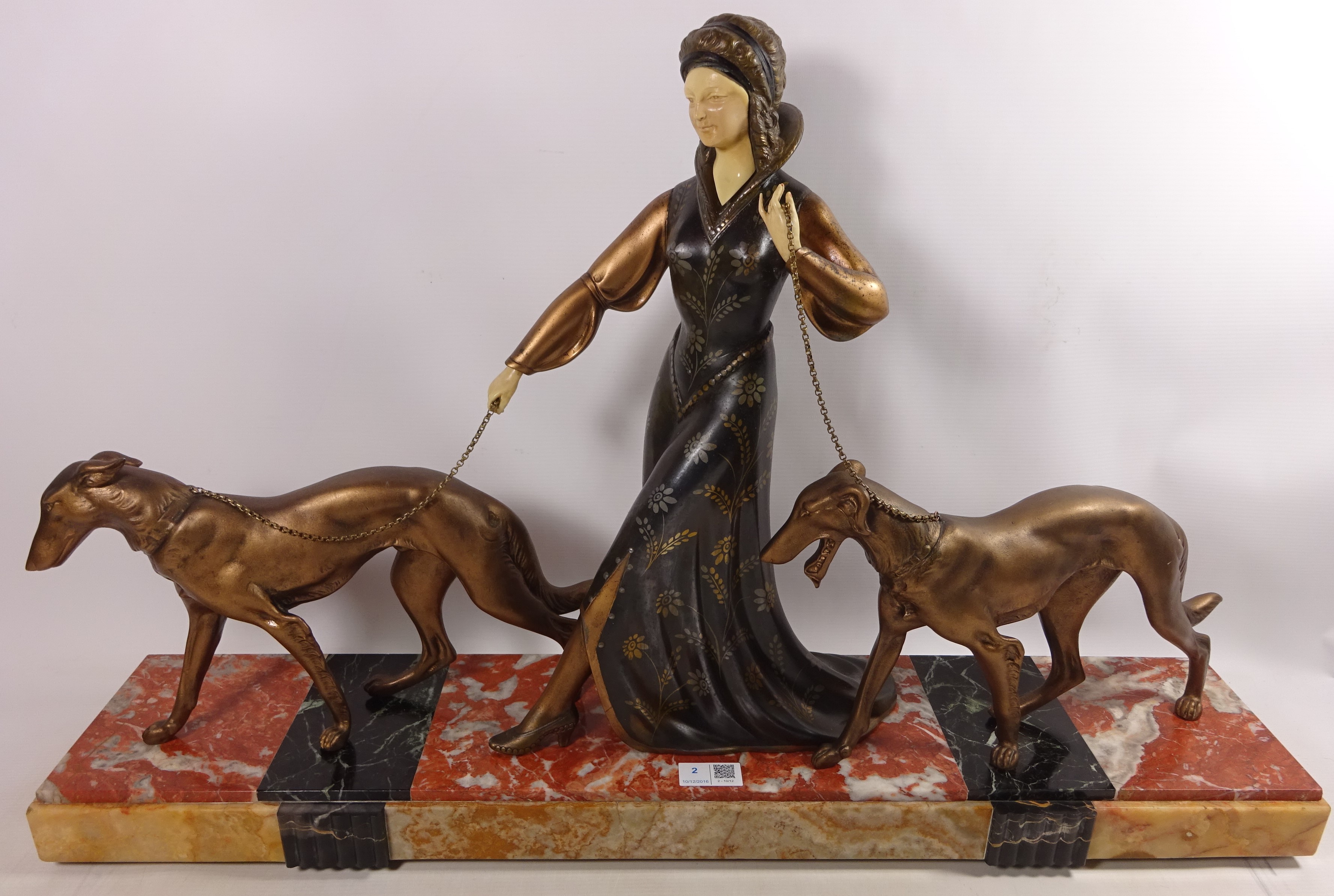 Art Deco spelter and ivorine group of a lady walking two Borzoi H49cm Condition Report