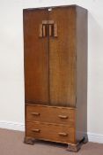 Early 20th century oak Gentleman's wardrobe fitted with two drawers, W74cm, H180cm,