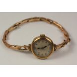 Ladies early 20th century rose gold wristwatch hallmarked 9ct on expandable strap rose gold strap