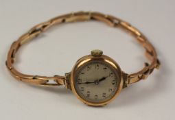 Ladies early 20th century rose gold wristwatch hallmarked 9ct on expandable strap rose gold strap