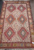 Turkish Soumak rug, embellished with stylised animal motifs on beige field,