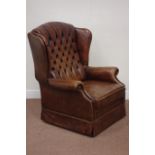 Georgian style wing back armchair upholstered in antique brown leather Condition Report