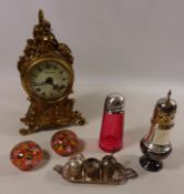 Gilded metal striking mantle clock, white metal Eastern condiment set,