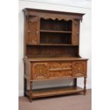 20th century oak dresser fitted with two cupboards and two drawers undertier below,