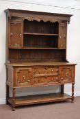 20th century oak dresser fitted with two cupboards and two drawers undertier below,