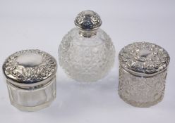 Edwardian silver top scent flask Chester 1909 and two dressing table jars Condition