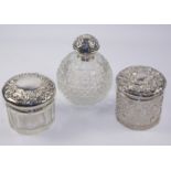 Edwardian silver top scent flask Chester 1909 and two dressing table jars Condition