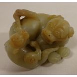 Pale green Jade caved model of a Dog and Pup,