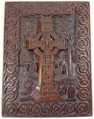 Late 19th century Irish oak panel relief carved with the round tower at Monasterboice and the