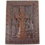 Late 19th century Irish oak panel relief carved with the round tower at Monasterboice and the