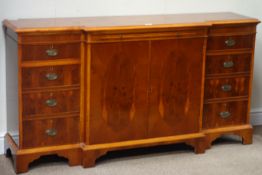 Wade yew wood breakfront side cabinet, double centre cupboard flanked by two single cupboard,
