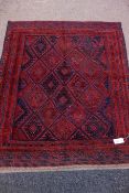 Tribal Gazak red and blue ground rug,