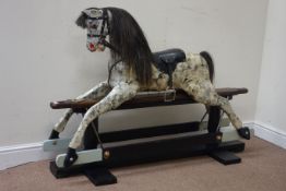 20th century painted carved wooden rocking Dapple Grey horse on trestle base,