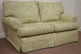 Multi-York two seat sofa upholstered in pale green fabric,